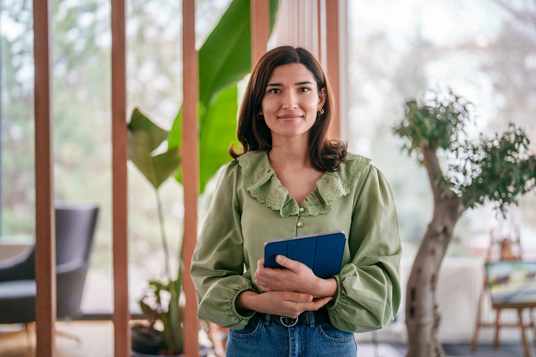 Woman holding a tablet